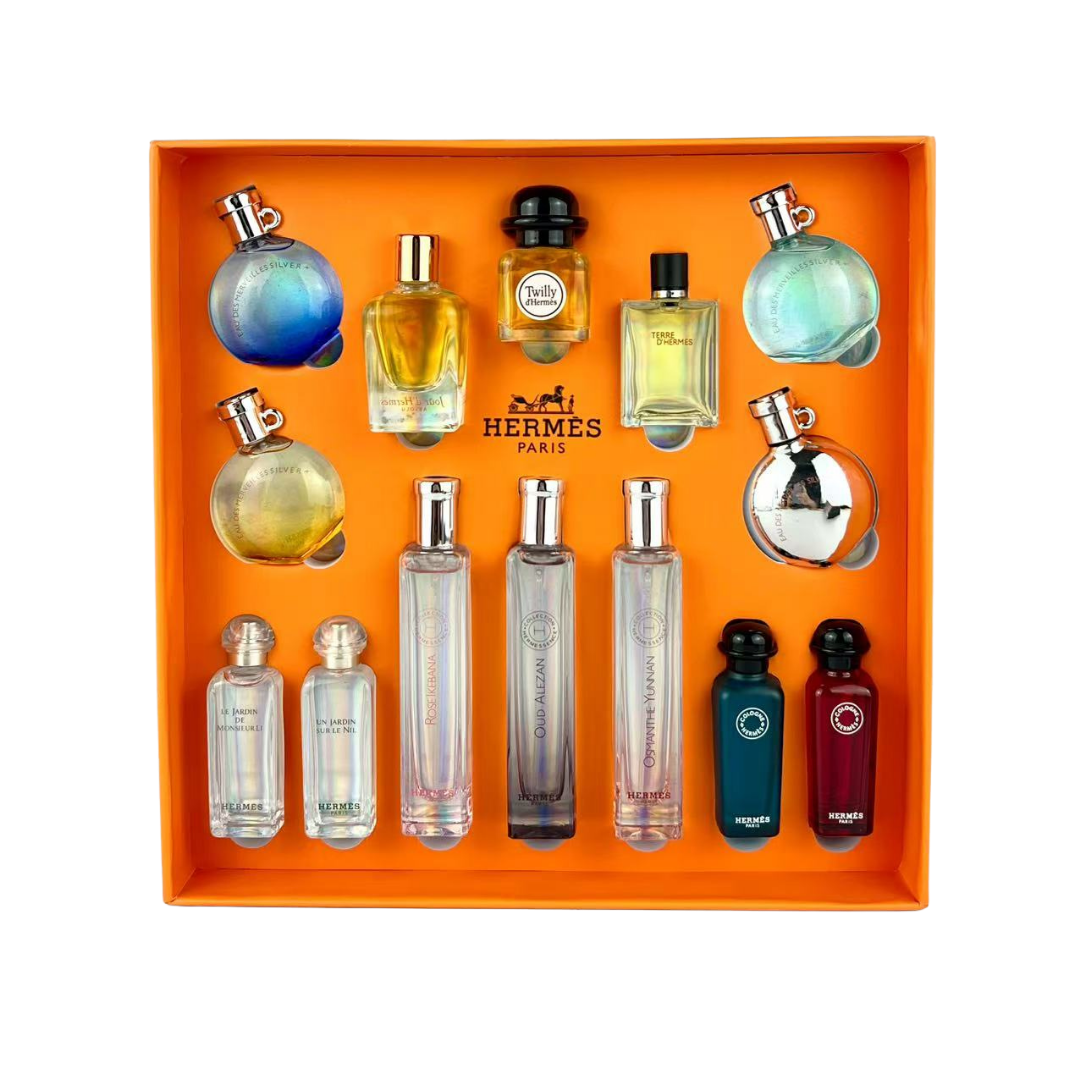 1 The Hermès Orange Blossom Selection Gift Set (14 pieces) includes Nile Garden 7.5ml Mr. Li's Garden 7.5ml Eau d'Orange Verte 7.5ml Blood Rhubarb 7.5ml Silk Scarf 7.5ml One Day's Light 7.5ml Earth 5ml, Orange Blossom 5ml Blue Blossom 5ml Dark Blossom 5ml Silver Blossom 5ml Oud Alezan 15ml Yunnan Osmanthus 15ml Rose Ikebana15ml - Image 1